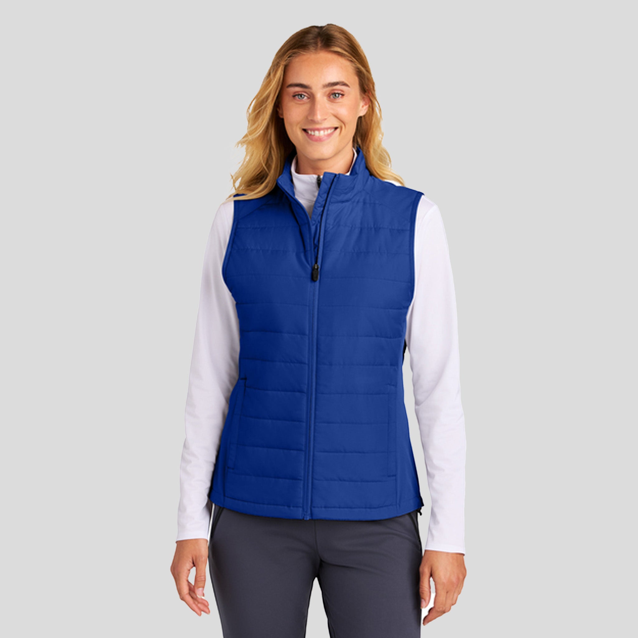 Womenโs Teknical Hybrid Vest | True Royal