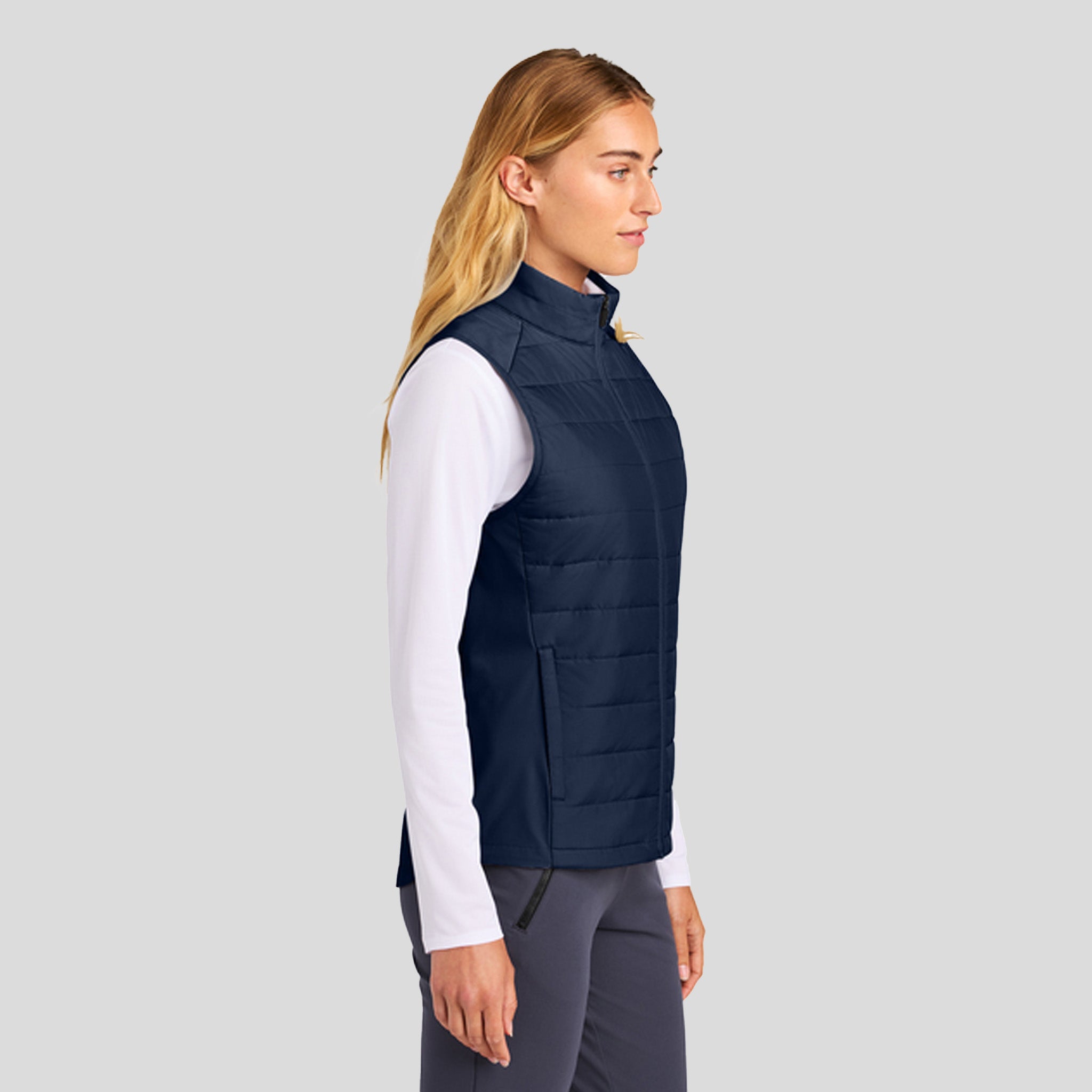 Womenโs Teknical Hybrid Vest | True Navy