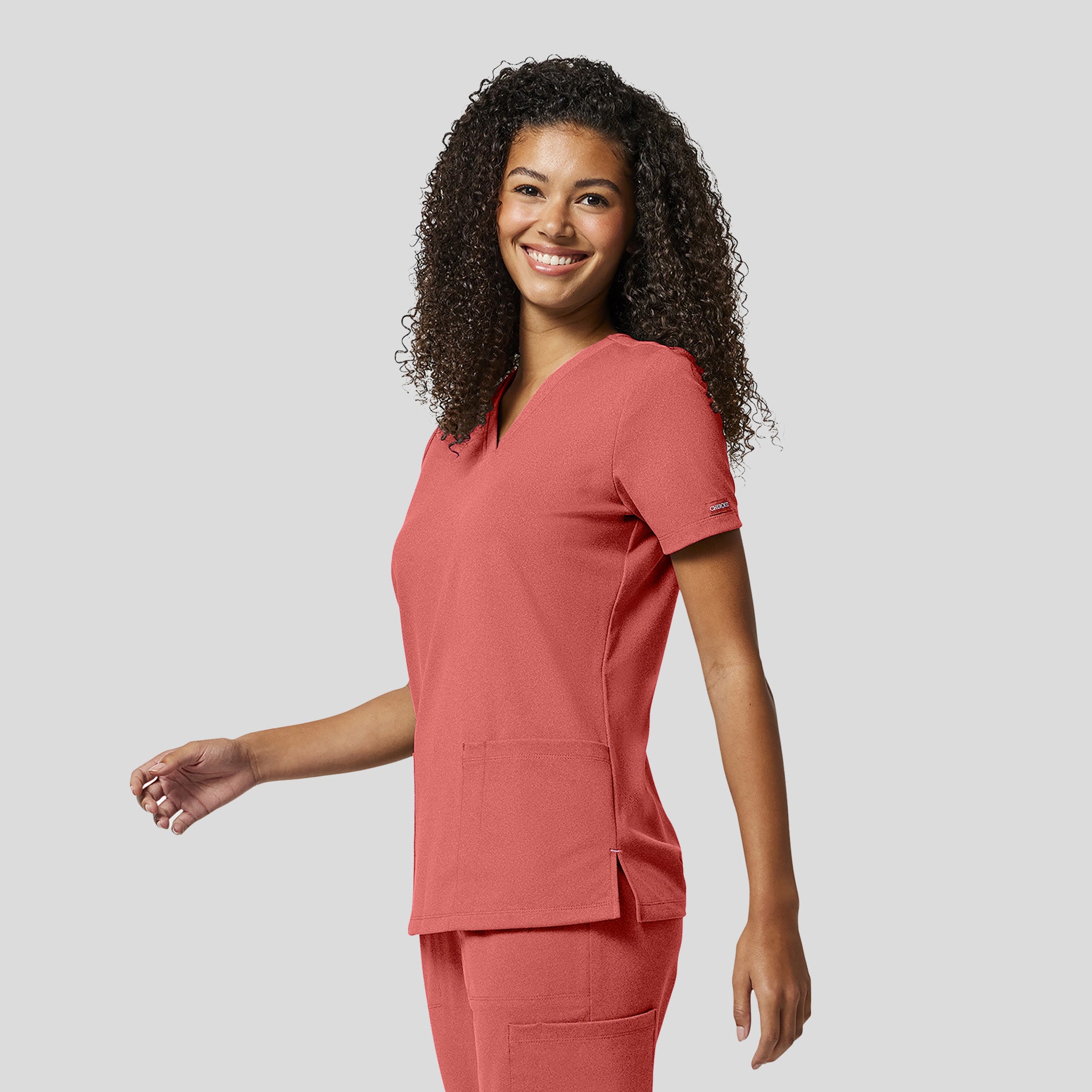 Achieve 2-Pocket Scrub Top | True Coral